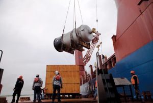 Cryogenic Plant Vessel discharging from ship to barge in the Amazon River