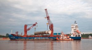 Deethanizer Tower discharging from ship to barge in the Amazon River